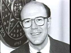 ["In a 1992 political TV ad, Republican Bob Anthony, running for Corporation Commissioner, portrays himself as a staunch consumer advocate. Scenes of Anthony at a podium, in an office, and interacting with documents emphasize his commitment to fighting for fiscal fairness and addressing overcharges. Text overlays commend his achievement of securing a $140 million consumer refund, establishing his record of saving money for Oklahomans and advocating for consumer rights and financial accountability."]