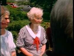 ["In a 1990 presidential campaign TV ad, Democratic candidate Kurt Glassco articulately criticizes his opponent's congressional voting record and actions. Throughout the ad, Glassco stands at podiums with American flag backdrops and campaign posters, confidently and seriously advocating for political change while directly addressing the audience."]