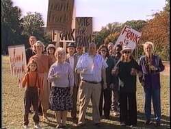 ["The 1994 political TV ad from Dan Hamburg's presidential campaign highlights the contrasting voting records of himself and opponent Frank Riggs. Featuring visuals of protesters and discontented faces against campaign signs, the ad positions Hamburg as a preferable alternative, emphasizing criticism of Riggs' political actions through concerned constituents' voices."]