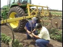 ["In the 1994 presidential campaign ad, Democratic candidate Charlie Stenholm emphasizes his deep roots and alignment with traditional, hardworking American values. Driving through rural landscapes, he warmly engages with the local, church-going populace, ensuring a genuine, heartfelt connection. His discussions in the truck with everyday Americans highlight his grounded, community-focused approach."]