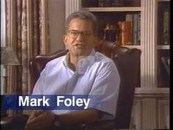 ["In the 1994 presidential campaign ad, Republican candidate Mark Foley addresses a town hall meeting, passionately speaking about immigration, welfare, and government spending as national priorities. The ad emphasizes Foleys commitment to stringent policies, showcasing scenes of him interacting with concerned citizens and speaking fervently on these critical issues."]