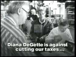 ["In Joe Rogers' 1996 political campaign ad, he's seen delivering a passionate speech on socio-economic reforms, apparently contrasting his policy views against those of Diana DeGette. The ad likely attempts to highlight Rogers' commitment to impactful legislation and differentiate his stance from his opponent���������s in a compelling setting."]