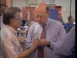 ["In the 1996 political ad, Republican James Bernard Longley, confidently addresses Congress and interacts with legislators to advocate for Maine's electronic industry and job growth. The ad portrays Longley as a dedicated leader committed to economic development, vividly emphasizing his efforts through scenes of discussions, handshakes, and passionate speeches to various audiences about enhancing job security and opportunities within Maine."]