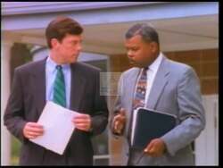 ["In his 1996 campaign ad, Republican Jon Lynn Christensen passionately outlines his vision for a safer, better-educated America. Addressing various audiences, he emphasizes his commitment to enhancing national safety, educational quality, and economic competitiveness to ensure a prosperous future. His repeated, emphatic gestures underline his dedication and appeal to voters for support."]