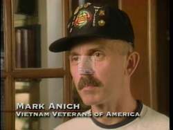 ["The 1996 political ad for Jon Lynn Christensen captures his confident, dedicated persona through scenes of him discussing strategy, speaking at various podiums to supporters, and engaging with veterans at community events in Nebraska. He exemplifies strong leadership, commitment to Nebraska values, and respect for military veterans, backed symbolically by American flags."]