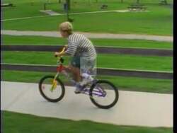 ["In his 1996 campaign ad, Republican Jon Lynn Christensen passionately advocates for child safety, focusing on supporting Megan's Law. He is seen discussing the law's importance at a podium and in various settings, including legislative and office environments, emphasizing family safety and legislative backing, resonating with viewers and reassuring concerned parents."]