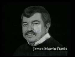 ["In a 1996 political TV ad, Jon Lynn Christensen is depicted in an adversarial meeting with James Martin Davis and union bosses. The dark, moody setting underscores the tension as Christensen stands firm against these figures, illustrating his resistance against union influence, aligning with his republican campaign messages."]