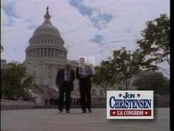 ["In his 1996 political ad, Republican presidential candidate Jon Lynn Christensen is endorsed by multiple law enforcement groups. Surrounded by supportive police officers, Christensen displays visible endorsements and engages positively with the officers, shaking hands and speaking about his commitment to law enforcement and advocating for stricter penalties on gun crimes."]
