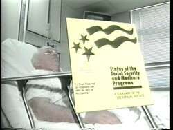 ["In the 1996 political TV ad for Jon Lynn Christensen, an elderly woman expresses concern over Medicare's future and endorses Christensen's reform plan. Featuring scenes of her watching a political ad on TV and discussing the importance of Medicare, the ad portrays Christensen as a defender of senior citizens' healthcare needs, advocating strongly at a podium. The ad concludes with the woman appearing relieved and hopeful, advocating for Christensens election."]