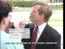 ["In the 1992 campaign ad, Democratic candidate Phil Sharp portrays himself as a champion of fiscal responsibility and taxpayer rights. Throughout the ad, Sharp is shown making firm commitments to reducing government waste and promoting a balanced budget. The imagery reinforces his message of integrity and dedication to ethical political practices, positioning Sharp as a prudent and responsible leader who prioritizes the financial security of his constituents."]
