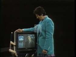 ["In the 1992 campaign ad for Democratic candidate Ada Deer, scenes alternate between the politician rehearsing her speech on key issues like healthcare, jobs, education, choice, and the environment. Throughout, she candidly self-critiques her performance, striving for sincerity over slickness in her delivery, emphasizing substance over style."]