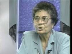 ["In the 1992 political ad, Democratic congressional candidate Ada Deer showcases her confidence and expertise. Through various scenes of public speaking, Deer emphasizes her readiness for Congress, addressing misconceptions around her qualifications and background. She highlights her unique perspective, convincing voters of her capability and insight as a congressional candidate."]