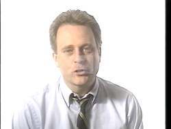 ["In the 1992 political TV ad for Republican candidate Scott Leo Klug, various scenes depict a determined and confident Klug passionately advocating for political reform. He is shown in Congress, at press conferences, and public speeches, fervently addressing corruption and promoting integrity. Each frame reinforces his resolve and commitment to significant legislative changes."]