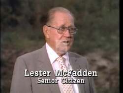["In the 1996 presidential campaign ad, Democratic candidate Glenn Poshard emphasized trust, integrity, and dedication to public service. Throughout various scenes, Poshard, dressed in a suit, spoke earnestly from a podium and directly to the camera, highlighting his commitment to accountability, constituent service, and responsible governance. American flags prominently featured in the background reinforced his patriotic message."]