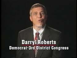 ["In his 1996 political ad, Democratic candidate Darryl F. Roberts passionately advocates for steadfast Democratic values while standing at a podium. Throughout the ad, he pledges loyalty to these ideals and denounces his opponent's inconsistency concerning political affiliations. Roberts seeks to differentiate himself by emphasizing his commitment to political consistency and integrity, urging voters to support a candidate who shares and upholds their values."]