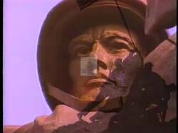 ["In his 1996 campaign ad, Democratic candidate Paul M. Barby passionately argues for reducing U.S. defense spending in Europe and Japan to prioritize domestic needs. He stands confidently at a podium, critiquing excessive overseas defense expenditures and advocating for reallocating these funds to address U.S. budget issues and national priorities."]