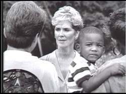 ["In her 1996 presidential campaign ad, Connie Galiazzo DeJuliis presents herself as a dedicated and passionate advocate for education and family values. Through various scenes of her engaging with the community and her family, the ad emphasizes her commitment to resilience, hard work, and connecting with voters' everyday struggles."]