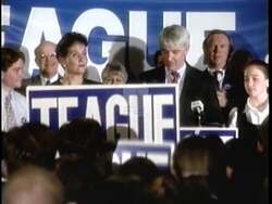 ["The 1996 presidential campaign ad for Republican candidate Edward Teague depicts him as a confident, trustworthy leader. Various scenes show Ed confidently addressing diverse audiences, promoting unity and successful policy initiatives. His interactions with constituents, professional demeanor, and the symbolism of eco-friendliness and bipartisan support characterize his campaign's emphasis on effective leadership and trustworthiness."]