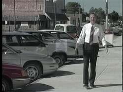 ["In the 1996 political TV ad for Republican candidate Jerry Moran, the focus is on his strong local roots and longstanding commitment to leadership within his Kansas community. Featuring multiple scenes of Moran in rural settings and his childhood home, the ad emphasizes his connection to traditional values and the importance of community improvement, underscoring his political experience and vision for leadership."]