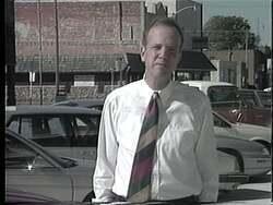 ["The 1996 TV ad for Jerry Moran's congressional campaign features him confidently addressing the camera in various settings. Wearing a suit, Moran emphasizes leadership and future prospects in Kansas, engaging potential voters with a persuasive smile and standing outdoors to connect with his roots. The ad underscores his commitment to leading and creating opportunities in Kansas."]
