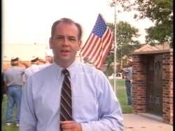 ["In a 1996 political TV advertisement, Democratic candidate Rick Weiland passionately communicates his concerns about U.S. military expenditures and the financial responsibilities shared with wealthy allies. Throughout various scenes, he emphasizes gratitude towards veterans and calls for a more equitable financial burden in defense alliances against a backdrop of American flags."]