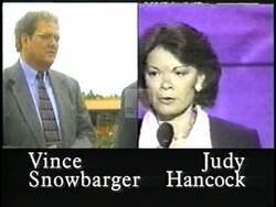 ["In the 1996 Republican campaign ad, Vince Snowbarger is favorably contrasted against Judy Hancock, who is criticized for opposing tax cuts and a balanced budget amendment. The ad portrays Snowbarger in positive settings such as speaking confidently at a podium and at a rally, emphasizing his support for tax reductions and displaying his endorsements prominently."]