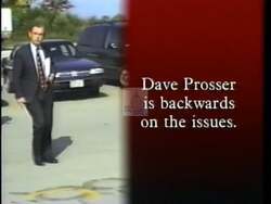 ["In a 1996 political TV ad, Democratic candidate Jay Johnson casts his opponent Dave Prosser in a negative light, focusing on Prossers controversial tax policies which purportedly favor big corporations over average citizens. The ad contrasts these with Johnsons own promises, showcasing scenes of Prosser with unflattering overlays and critical commentary, emphasizing Prosser's alignment with corporate interests and tax mismanagement. Johnson is portrayed as sincere and confident, engaging directly with viewers."]