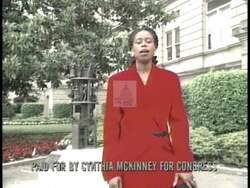 ["In the 1996 political TV ad, Democratic candidate Cynthia McKinney promotes her campaign for Congress. Dubbed the \"Pride of Georgia,\" McKinney confidently addresses the camera across various scenes, encouraging voter participation. With a patriotic backdrop, she emphatically stresses the importance of voting on July 9th, aiming to rally support and pride among Georgian voters."]