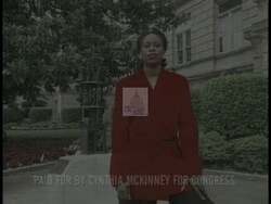 ["In the 1996 political TV ad, Democratic Party candidate Cynthia McKinney confidently promotes her campaign for Congress, presenting herself as Georgia's dedicated representative. Throughout the ad, McKinney displays a self-assured demeanor, with scenes emphasizing her confidence and commitment under the slogan \"Pride of Georgia, Congress.\""]