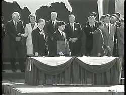 ["The 1996 political TV ad for John McKee Spratt features repeated contrasts between him, Larry Bigum, and Newt Gingrich. The video showcases Bigum and Gingrich consistently plotting major cuts to Medicare, while Spratt resolutely opposes these plans, positioning himself as a staunch defender of senior healthcare rights and values."]