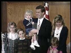 ["The 1996 GOP campaign ad for Thomas M. Reynolds focuses on a family-centered platform. Scenes show Reynolds amongst supporters at rallies, emphasizing job retention, Social Security security, and strengthening family values. He presents himself surrounded by family and diverse crowds, promising a prosperous future grounded in unity and hope."]
