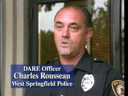 ["In her 1996 campaign ad, Jane Maria Swift criticizes her opponent, John Oliver, for supporting college scholarships for criminals. Throughout the ad, Swift is seen debating and speaking passionately at a podium, arguing that educational funds should be reserved for law-abiding citizens instead, clearly positioning herself as tough on crime."]