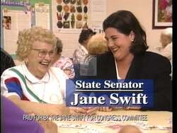["In the 1996 presidential campaign ad for Republican candidate Jane Maria Swift, various elderly speakers, likely relatives, praise Swift's dedication to senior citizens' welfare. Set in cozy rooms, with soft, inviting backdrops and photos of Swift, the ad emphasizes her strong advocacy and commitment to improving seniors' lives."]