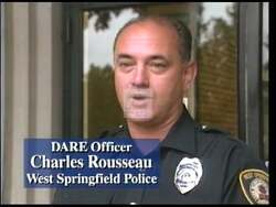 ["In her 1996 political TV ad, Republican candidate Jane Maria Swift emphasizes a tough-on-crime agenda, starkly opposing educational benefits, like college scholarships, for inmates. Throughout multiple scenes, Swift criticizes her opponent, John Oliver, for his differing stance on the issue, promising to change policies and prioritize family and education grants over scholarships for criminals."]