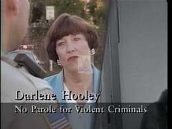 ["In the 1996 presidential campaign TV ad for Democratic Party candidate Darlene Hooley, she strongly emphasized her dedication to public safety. Scenes of Hooley in discussion, listening attentively, and speaking at podiums highlighted her commitment to community engagement, strict legal reforms, and stricter gun control laws, demonstrating a serious, focused approach to enhancing community security."]