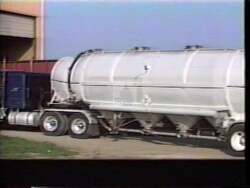 ["In the 1992 presidential campaign ad for Drew Edmondson, scenes unfold across Oklahoma factories and meetings where Edmondson passionately discusses his commitment to preserving local jobs and revitalizing the economy. With a backdrop of American flags and engaged workers, he emphasizes robust economic strategies aimed at retaining and attracting jobs to strengthen Oklahomas future."]