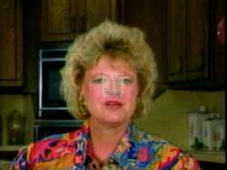 ["In the 1994 campaign ad, Suzy Brewster endorses her husband, Bill K. Brewster, for Congress. She praises his integrity and effectiveness as a congressman, emphasizing the strong family values they share. Throughout the ad, Suzy appears in a cozy living room, speaking directly to the camera, reaffirming her husband's suitability for re-election through her warm, confident endorsements beside familiar settings and family photos."]