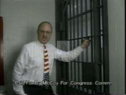 ["In the 1994 political ad, various endorsers, including an elderly man and a crime victim, commend Democratic candidate Tully McCoy for his tough stance on crime. McCoy, running for Congress, is portrayed positively amid campaign banners and American flags, using the slogan \"Slam the door on crime\" as a central theme."]