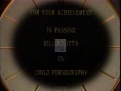["The 1994 political TV ad for Republican Joan King Hastings showcases her confident appeals at various podiums, emphasizing her legislative achievements, qualifications for leadership, and calls for electoral support. Key scenes depict her addressing attentive crowds, advocating strongly for her candidacy, and detailing her success in lawmaking and financial management."]