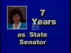 ["In her 1990 presidential campaign ad, Ann Reidolch radiates confidence and dedication. Scenes showcase her engaging with supporters and speaking at various locations across Idaho. With imagery of Idaho's landscapes and fervent rallies, the ad emphasizes her connection to local values and her commitment to addressing the state's needs in Congress."]