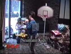 ["In his 1996 campaign TV ad, Republican Mark Neumann centers on fiscal responsibility and education reform. Through various scenes, Neumann presents himself as dedicated to securing a prosperous future, emphasizing family values and safety for children. He focuses on community engagement and portrays a family-oriented image, understanding voter concerns."]