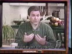 ["The political TV ad for David Ross (Dave) Obey's 1996 campaign portrays his opponent Scott West negatively. The ad features various scenes highlighting critiques of West's policies, repeatedly suggesting they endanger seniors and education. Graphics and text overlays emphasize the potential harm of his policies, aiming to cast doubt among voters about West's suitability for office, particularly concerning social programs in Wisconsin."]