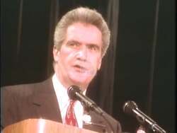 ["The 1996 political TV ad for Democratic candidate Bill Coyne illustrates his deep commitment to community and leadership. Featuring scenes of him addressing and actively engaging in community and committee meetings, the ad underscores his dedication to legislative action and community improvement. Coynes hands-on involvement and attentiveness to constituents highlight his determined efforts to address local needs."]