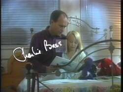 ["In Charlie Bass's 1996 presidential campaign ad, he emphasizes the importance of reducing the national debt to secure a better future for the next generations. Various scenes feature Bass discussing fiscal responsibility and budget reforms, often illustrated through interactions with his young daughter Lucy and other children, underscoring the long-term impact of current fiscal policies on young lives."]
