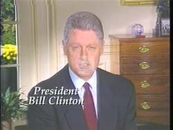 ["In his 1996 presidential campaign ad, Peter Navarro confidently addresses various audiences, advocating strong policies on education, healthcare, and senior support. Scenes show him speaking passionately at a podium and rallies, emphasizing his commitment to these key societal issues with supportive, engaged crowds surrounding him."]