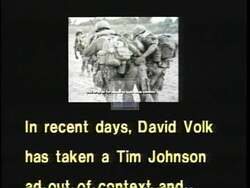 ["In a 1988 campaign ad, Democratic candidate Tim Johnson responds to rival David Volk, who misleadingly attacked Johnson's military record. The ad features scenes that clarify Johnson was honorably discharged due to a hearing loss, not draft dodging as Volk implies. Johnson appears beside his uniform, confirming his dedicated service history."]