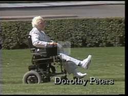 ["In the 1990 campaign ad, Republican candidate Jim Ramstad addresses the issue of accessibility for disabled individuals. Repeated scenes depict a person in a wheelchair facing inaccessible buildings and staircases, symbolizing societal barriers. The ad culminates with Senator Ramstad assisting a person in a wheelchair, underscoring his commitment to improving disability rights and inclusivity."]