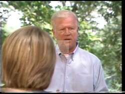 ["In Saxby Chambliss' 1996 political TV ad, scenes at Robins Air Force Base illustrate the vital roles of military personnel in maintenance and strategic planning. Chambliss emphatically speaks about defending these jobs against potential cuts, highlighting his commitment to national security and local employment stability at a public rally."]