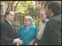 ["In his 1994 presidential campaign ad, Democratic candidate Mike Ward emphasizes his commitment to education and gun control, showcased in various earnest scenarios: discussing policies, giving speeches, and engaging with crowds. Scenes depict Ward's professionalism and leadership, supported by campaign posters and American flags, aiming to connect with voters on significant reforms."]