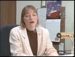 ["The 1998 political ad for Republican candidate Chris Collins features multiple scenes that collectively emphasize his role in revitalizing the local economy and boosting employment. Set in an industrial backdrop, workers commend Collins for his efforts in job creation and industrial revitalization, showing gratitude and support by shaking hands with him, depicting him as a leader committed to community prosperity."]